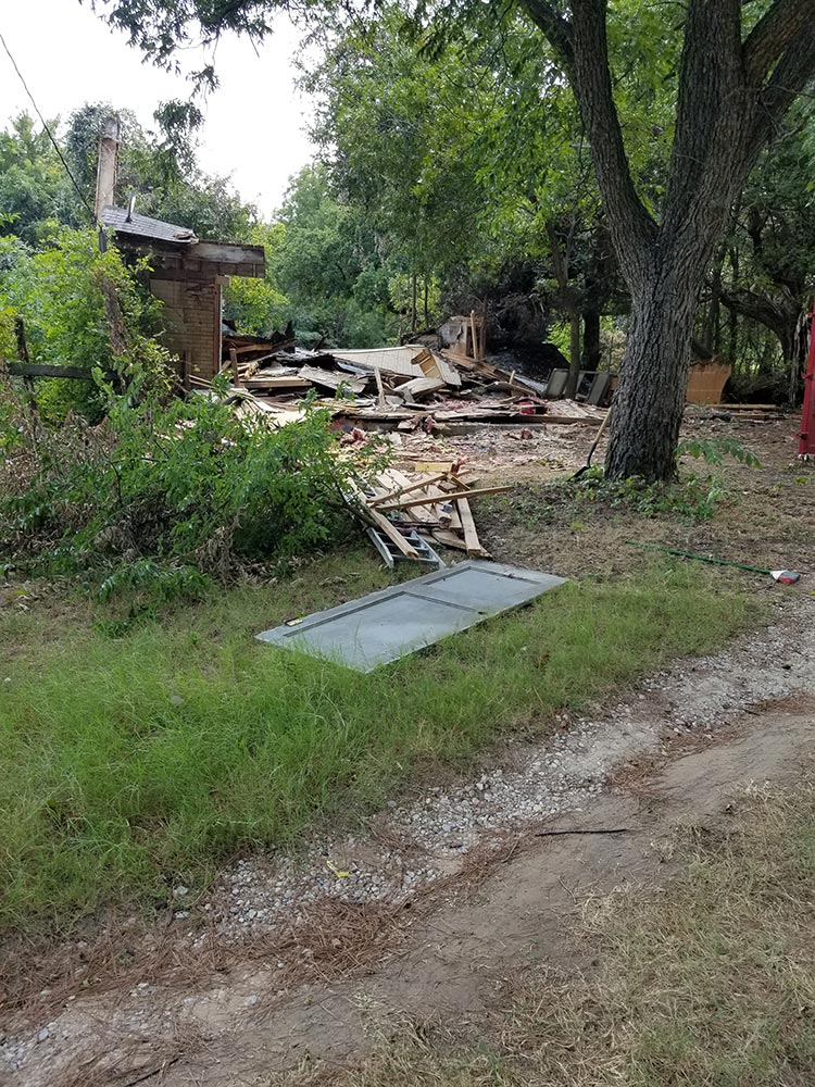 Tearing down old structures to make way for Cozy Acre